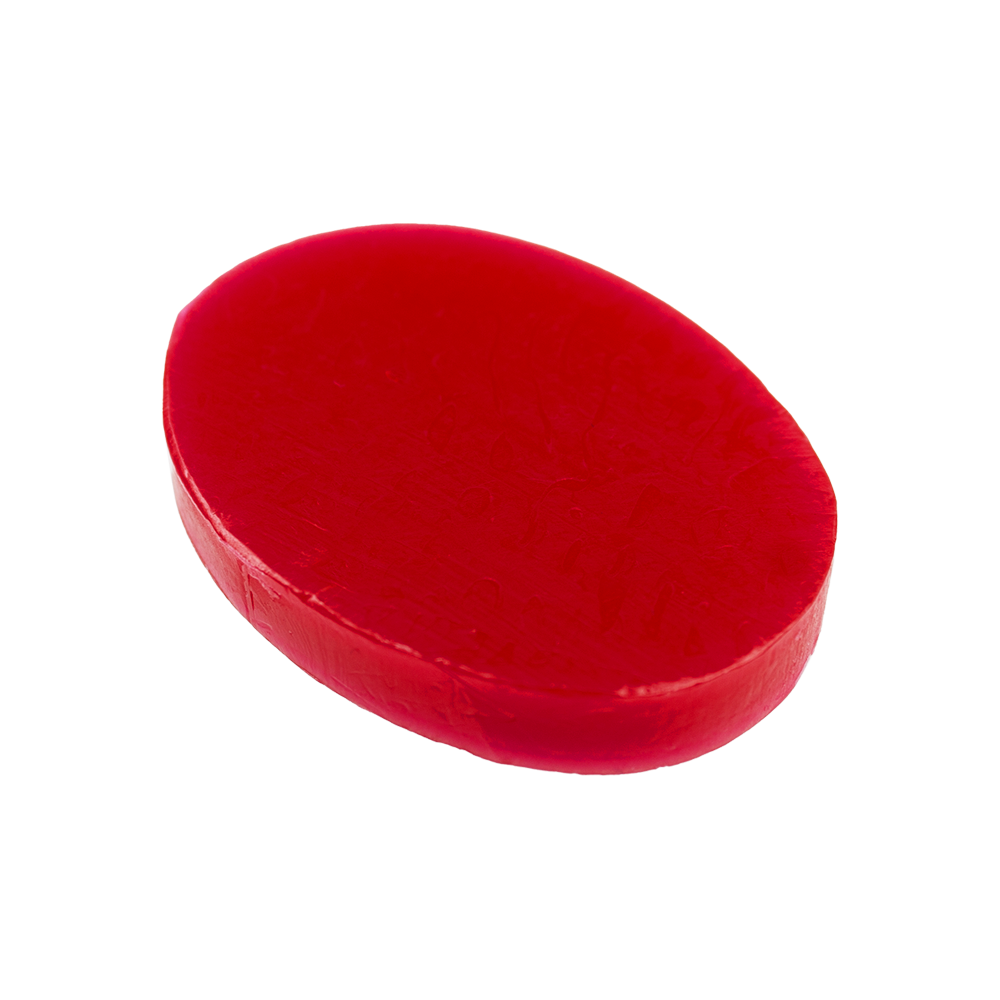 604_Fingerwachs_1ffOlTEz7K6don Das Bild zeigt ein rotes, ovales Stück Fingerwachs. Es wird häufig im Theater oder zu Halloween für Schmink- und Spezialeffekte verwendet.