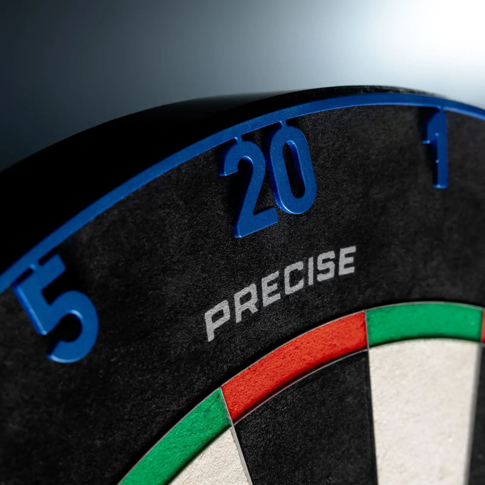 Precise 180 OnePiece Lasercut Number Ring Das Bild zeigt ein Dart-Zubehör. Es handelt sich um einen OnePiece Lasercut Zahlenring ArcticBlue.