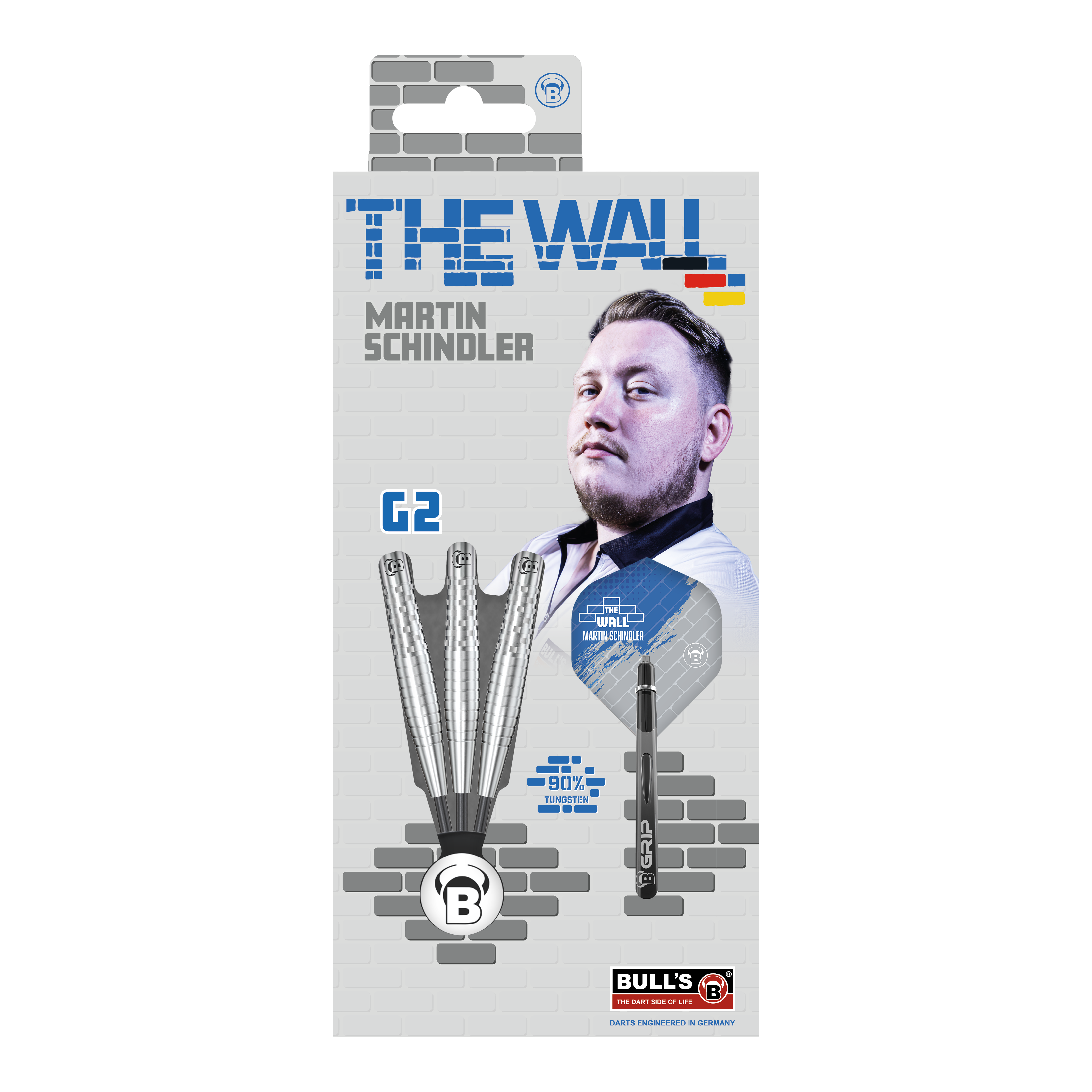 Bulls Martin Schindler Original Generation 2 steel darts Die Verpackung zeigt die "Bulls Martin Schindler Original Generation 2 Steeldarts" mit dem Bild von Martin Schindler. Auf der Vorderseite sind drei Darts und die Aufschrift "THE WALL" sowie "90% Tungsten" abgebildet.