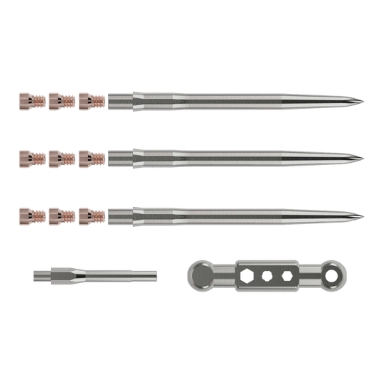Caliburn Starter Kit Das Bild zeigt das Caliburn Starter-Kit mit mehreren metallischen Komponenten. Zu sehen sind lange, spitze Stäbe, kleine Schrauben sowie zwei weitere Werkzeugteile.
