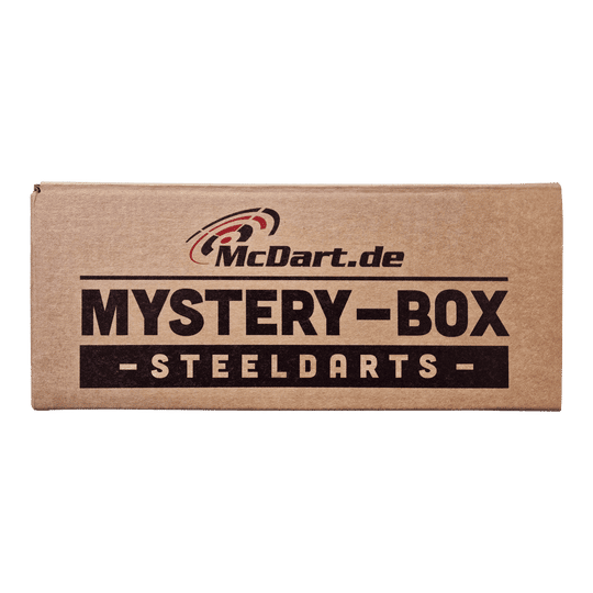 Phil Taylor Mystery Soft Dart Fan Box Auf dem Bild ist eine braune Box mit der Aufschrift "McDart.de Mystery-Box Steeldarts" zu sehen. Es handelt sich um eine Überraschungsbox für Steeldart-Fans.
