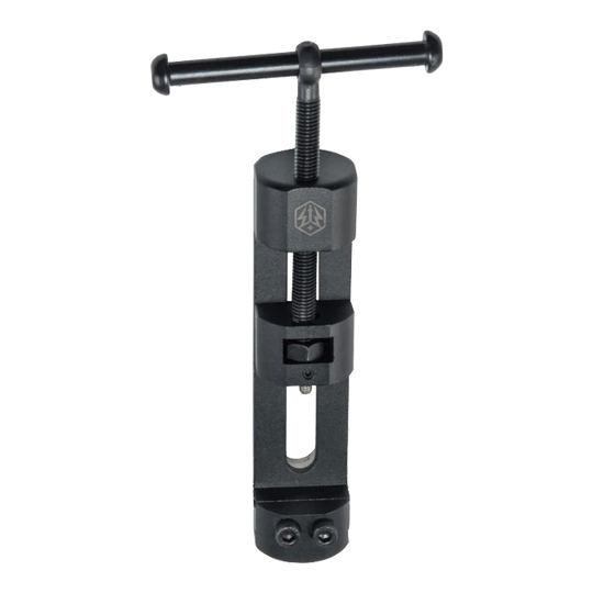 Das Bild präsentiert das Caliburn Professional Darts Repointing Tool - Spitzenwechsler. Dieses Produkt erleichtert den Austausch von Dartspitzen.