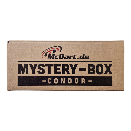 McDart Condor Mystery Box Auf dem Bild ist ein brauner Karton mit der Aufschrift "McDart.de Mystery-Box - Condor -" zu sehen. Die Schachtel wirkt geheimnisvoll und lädt zum Entdecken ein.